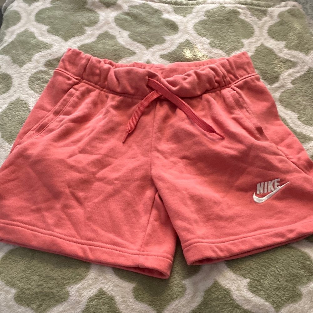 Coral Nike shorts